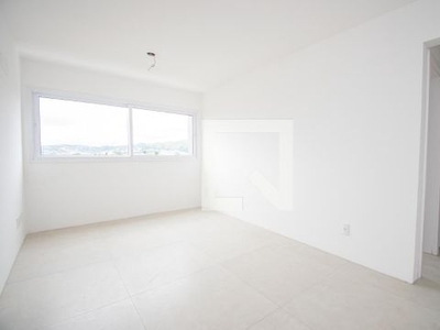 APARTAMENTO no 9º andar com 2 dormitórios e 1 garagem