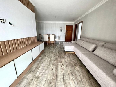 Apartamento com 2 dormitórios à venda, 65 m² por R$ 450.000,00 - Caiçara - Praia Grande/SP