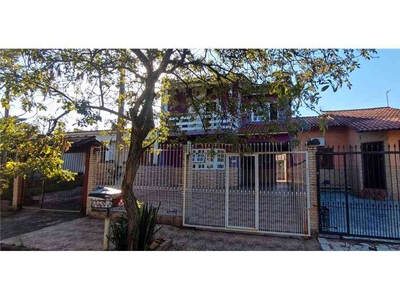 Casa com 4 quartos à venda no bairro Jardim Algarve, 153m²