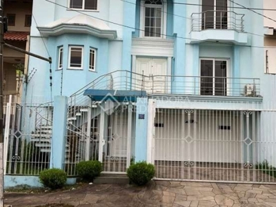 Casa em condomínio fechado com 3 quartos à venda na rua vinícius de moraes, 71, marechal rondon, canoas, 390 m2 por r$ 2.500.000