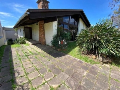 Casa com 4 quartos à venda na indianopolis, 30, três figueiras, porto alegre por r$ 1.690.000