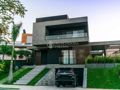 Casa em condomínio fechado com 5 quartos à venda na rodovia doutor antônio luiz moura gonzaga, 3801, rio tavares, florianópolis, 448 m2 por r$ 8.000.000