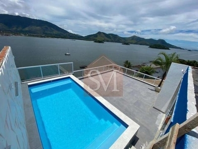 Casa triplex em angra dos reis de frente para o mar 5 suítes com 500m2 de área construida ....