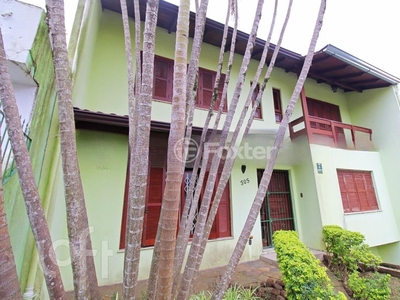 Casa 3 dorms à venda Rua Coronel Tisiano F. de Leoni, Coronel Aparício Borges - Porto Alegre