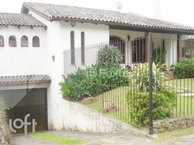 Casa 4 dorms à venda Rua Olécio Cavedini, Espírito Santo - Porto Alegre
