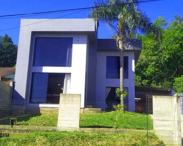 Excelente casa no centro de Nova Santa Rita em alto padrão com 3 dormitórios