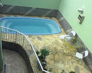 Vendo casa em condomínio na Taquara com 3 quartos e piscina