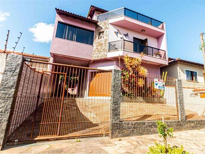 Casa com 3 quartos à venda no bairro Jardim Algarve, 250m²