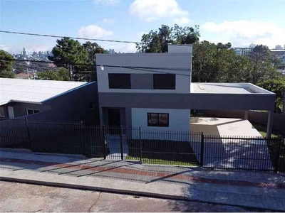 Casa com 3 quartos à venda no bairro Vila Luiza, 136m²