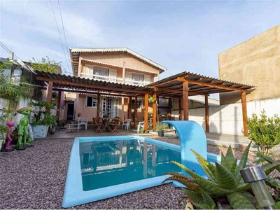 Casa com 5 quartos à venda no bairro Jardim do Bosque, 200m²
