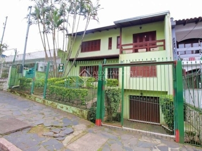 Casa com 3 quartos à venda na rua coronel tisiano f. de leoni, 305, coronel aparício borges, porto alegre, 274 m2 por r$ 799.000