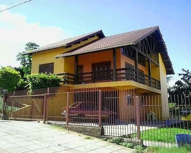 Casa com 4 Dormitorio(s) localizado(a) no bairro Centro em Nova Santa Rita / RIO GRANDE D