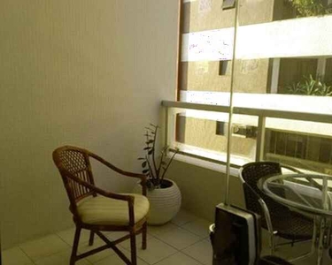 Vendo Loft alto padrão com um quarto com vista para Baia de todos os Santos no corredor da