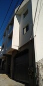 Vendo um prédio com 5 apartamentos de 2 quartos, sala, cozinha, banheiro e área de serviço e 1 vaga