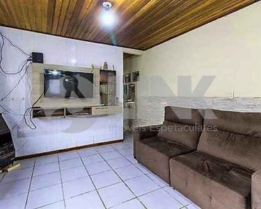 Casa com 3 dormitórios sendo 1 suíte americana à venda no bairro Menino Deus em Porto Aleg