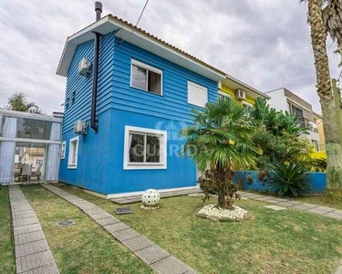Casa para comprar no bairro Lomba do Pinheiro - Porto Alegre com 3 quartos