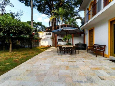Casa com 5 quartos à venda no bairro Jardim das Bandeiras, 300m²