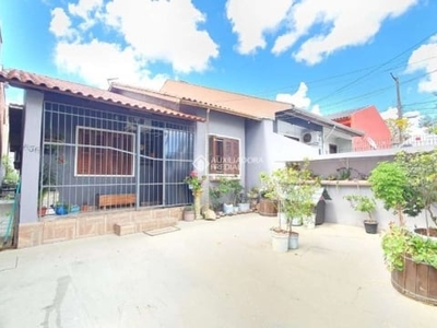 Casa com 3 quartos à venda na rua anhumas, 636, jardim algarve, alvorada, 80 m2 por r$ 395.000