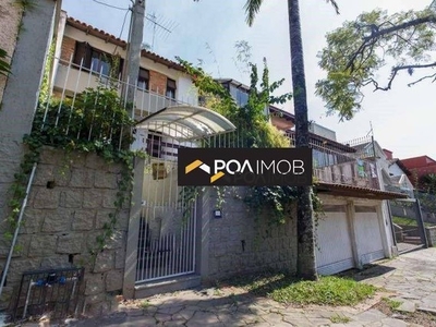 Casa com 4 dormitórios para alugar, 270 m² por R$ 7.000,00/mês - Chácara das Pedras - Port
