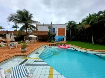 Casa com 6 suítes à venda em condomínio jardim acapulco - guarujá/sp