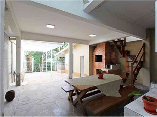 Casa com 3 quartos à venda no bairro Medianeira, 198m²