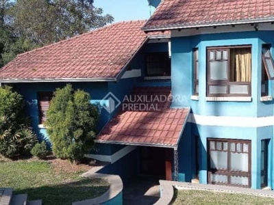 Casa em condomínio fechado com 4 quartos à venda na gramado, 326, centro, portão, 325 m2 por r$ 1.200.000