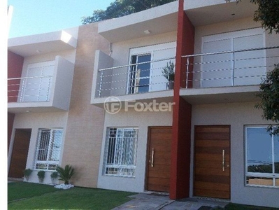 Casa 2 dorms à venda Avenida Vereador Roberto Landel de Moura, Campo Novo - Porto Alegre