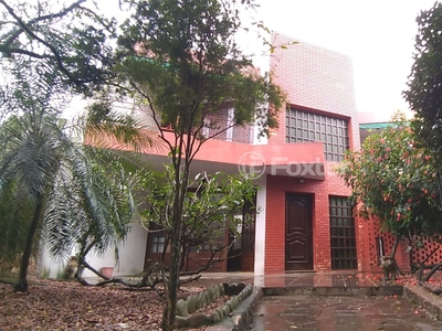 Casa 5 dorms à venda Rua Charruas, Espírito Santo - Porto Alegre