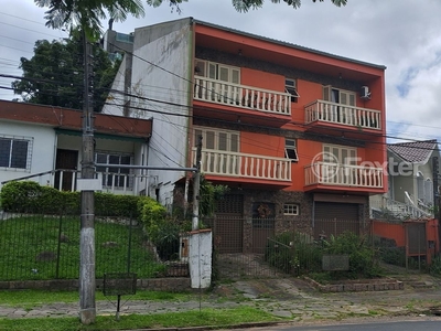 Casa 4 dorms à venda Rua Doutor Barbosa Gonçalves, Chácara das Pedras - Porto Alegre