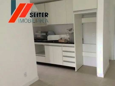 Apartamento de 2 dormitórios com suite semi mobiliado e sacada com churrasqueira