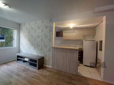 Apartamento com 2 quartos, semimobiliado à venda