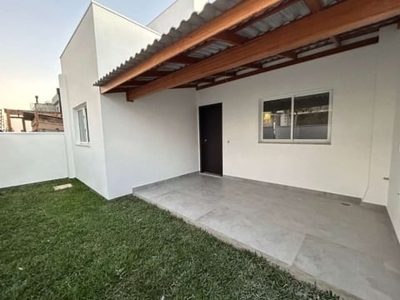 Casa em condomínio fechado à venda no bairro biguaçu