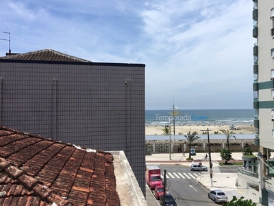 Pé na areia praia Guilhermina