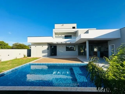 Casa nova à venda em condomínio na represa, com piscina e 4 suítes