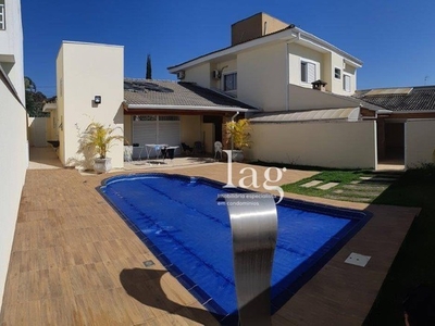 Casa com 3 dormitórios à venda, 347 m² por R$ 1.400.000,00 - Condomínio Lago da Serra - Ar