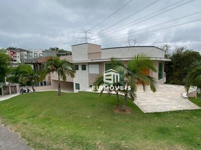 Casa com 4 dormitórios à venda, 500 m² por R$ 2.970.000,00 - Condominio Aruãecopark - Mogi
