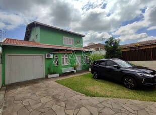 Casa com 4 quartos à venda na rua rudi schaly, 205, parque santa fé, porto alegre por r$ 530.000