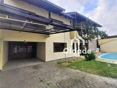 Casa com 01 suíte master + 2 dormitórios para alugar por R$ 3.900/mês - Centro - Jaraguá d
