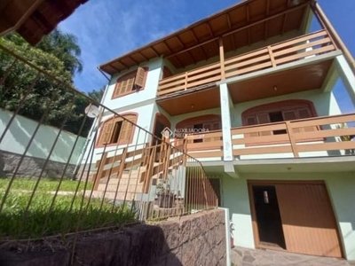 Casa em condomínio fechado com 7 quartos para alugar na rua taveira júnior, 507, nonoai, porto alegre, 403 m2 por r$ 4.500