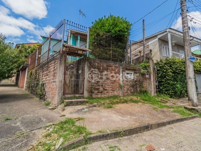 Casa 4 dorms à venda Rua Três Mil Setecentos e Setenta e Sete, Lomba do Pinheiro - Porto Alegre