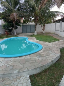 Casa com piscina tipo chácara em condomínio fechado
