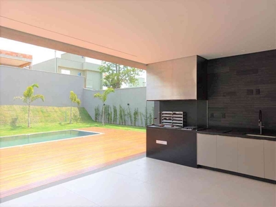 Casa em Condomínio com 4 quartos à venda no bairro Alphaville - Lagoa dos Ingleses, 390m²