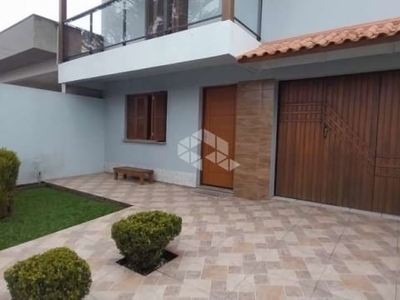 Casa com 3 quartos à venda na argentina, 292, centro, eldorado do sul, 144 m2 por r$ 850.000