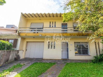 Casa 3 dorms à venda Avenida Teixeira Mendes, Chácara das Pedras - Porto Alegre