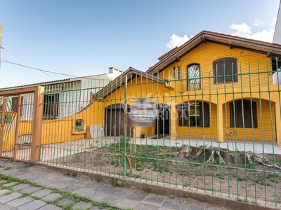 Casa 4 dorms à venda Rua Alfredo Silveira Dias, Nonoai - Porto Alegre