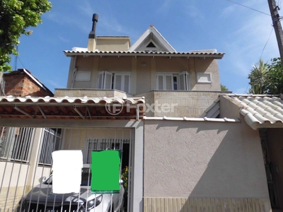 Casa 4 dorms à venda Rua Querubim Costa, Coronel Aparício Borges - Porto Alegre