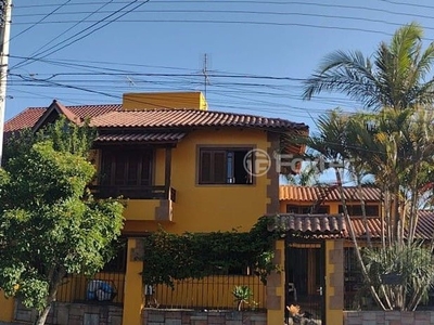 Casa 4 dorms à venda Rua Rodolpho Espinoza, Hípica - Porto Alegre