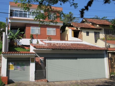 Casa 5 dorms à venda Rua Dante Poggetti, Jardim Itu - Porto Alegre