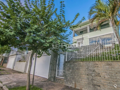 Casa 5 dorms à venda Rua Oscar Tollens, Santa Tereza - Porto Alegre