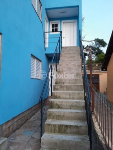 Casa 8 dorms à venda Rua Laguna, Cavalhada - Porto Alegre